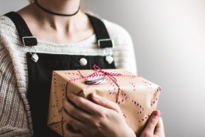 girl holding gift